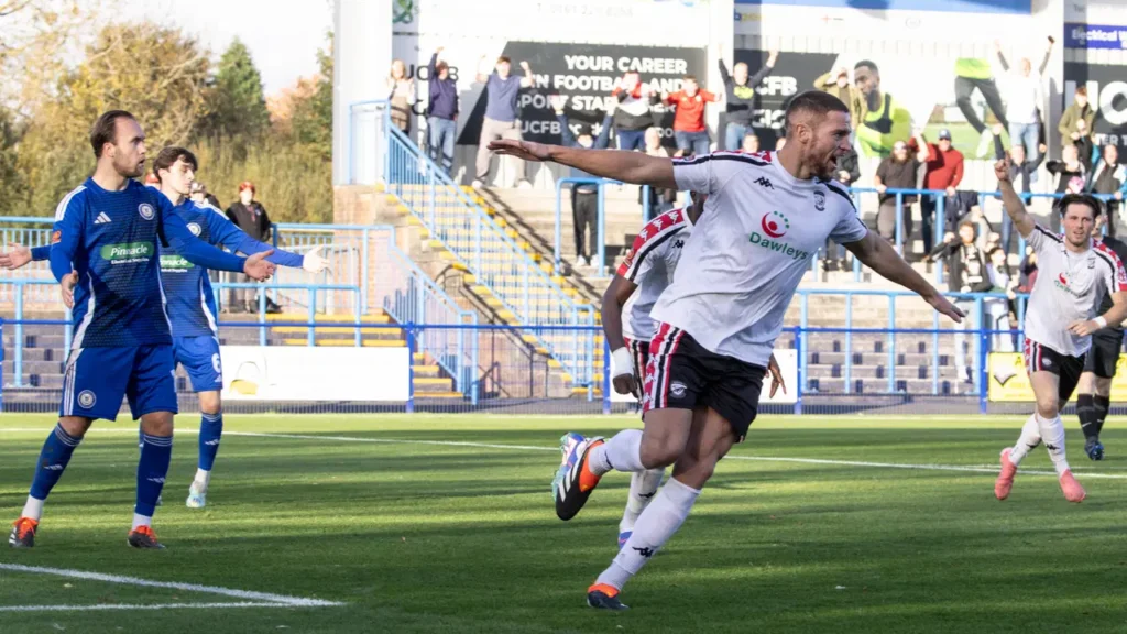 Matt Preston celebrates in Hereford FC kit after signing a new deal for the 2025/26 National League North season